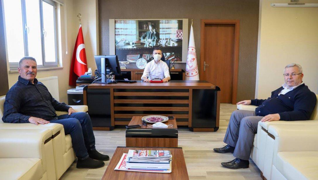 MHP Burdur  İl Başkanı Hikmet ÖKTE ve Türk Eğitim Sen Burdur Şube Başkanı Orhan AKIN,  İl Millî Eğitim Müdürümüz Ömer YILMAZ'ı Makamında Ziyaret Etti